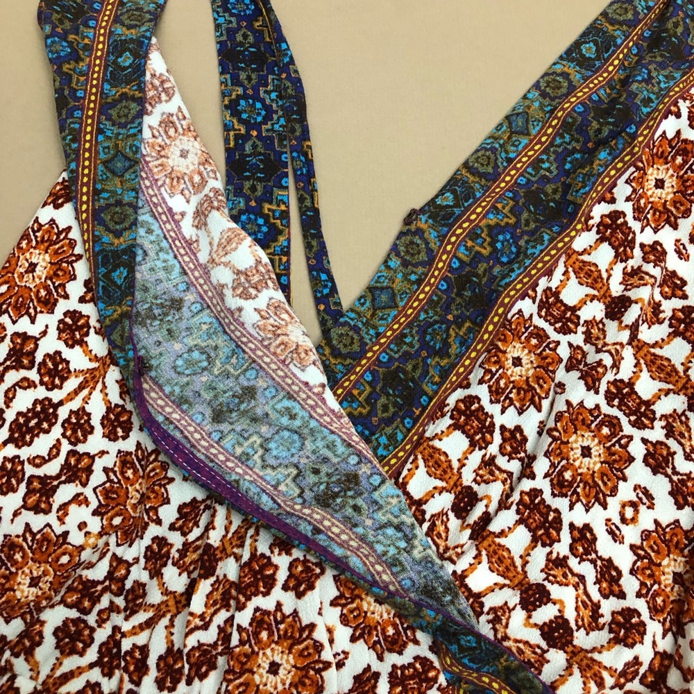 Surplice Boho Floral Criss Cross Back Romper - Picture 9 of 16